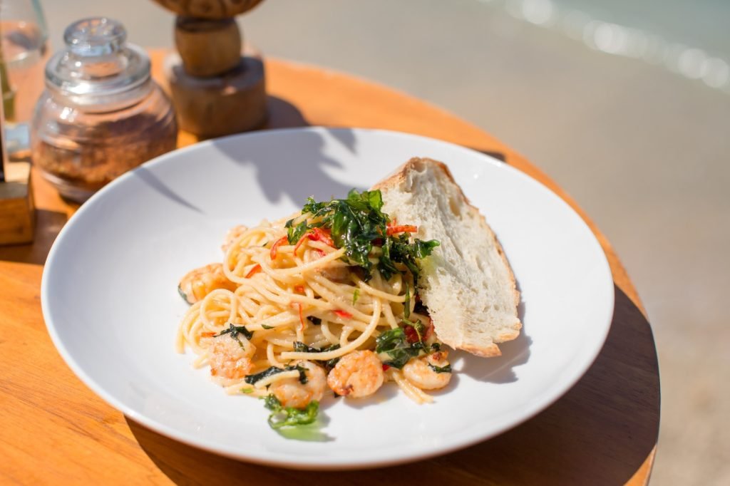 Pasta with beach view at Penida Colada, Nusa Penida
